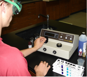 research-sponsored-research-fluorometer Research student uses fluorometer